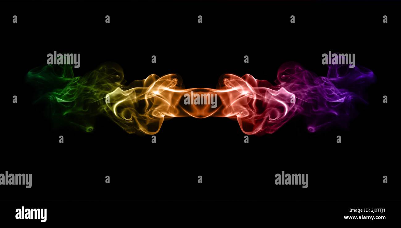 Multicolored smoke isolated on black background close up Stock Photo