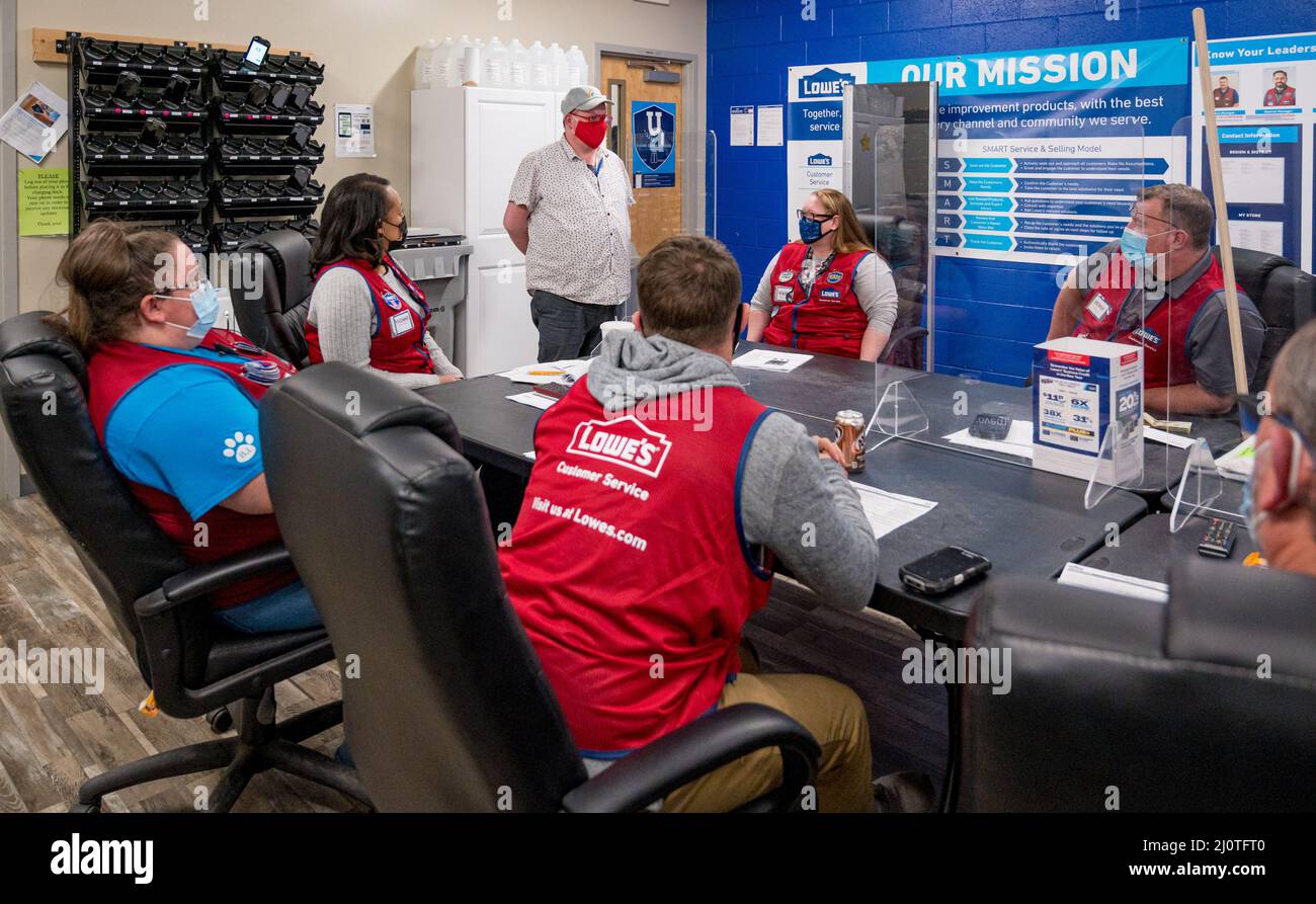 Mayfield, KY, January 24, 2022 -- At the local Lowes, FEMA mitigation specialist Eugene McFee briefs Lowes employees about information FEMA is offering to tornado survivors. The December 2021 tornadoes devastated this small town. Photo by Liz Roll/FEMA Stock Photo