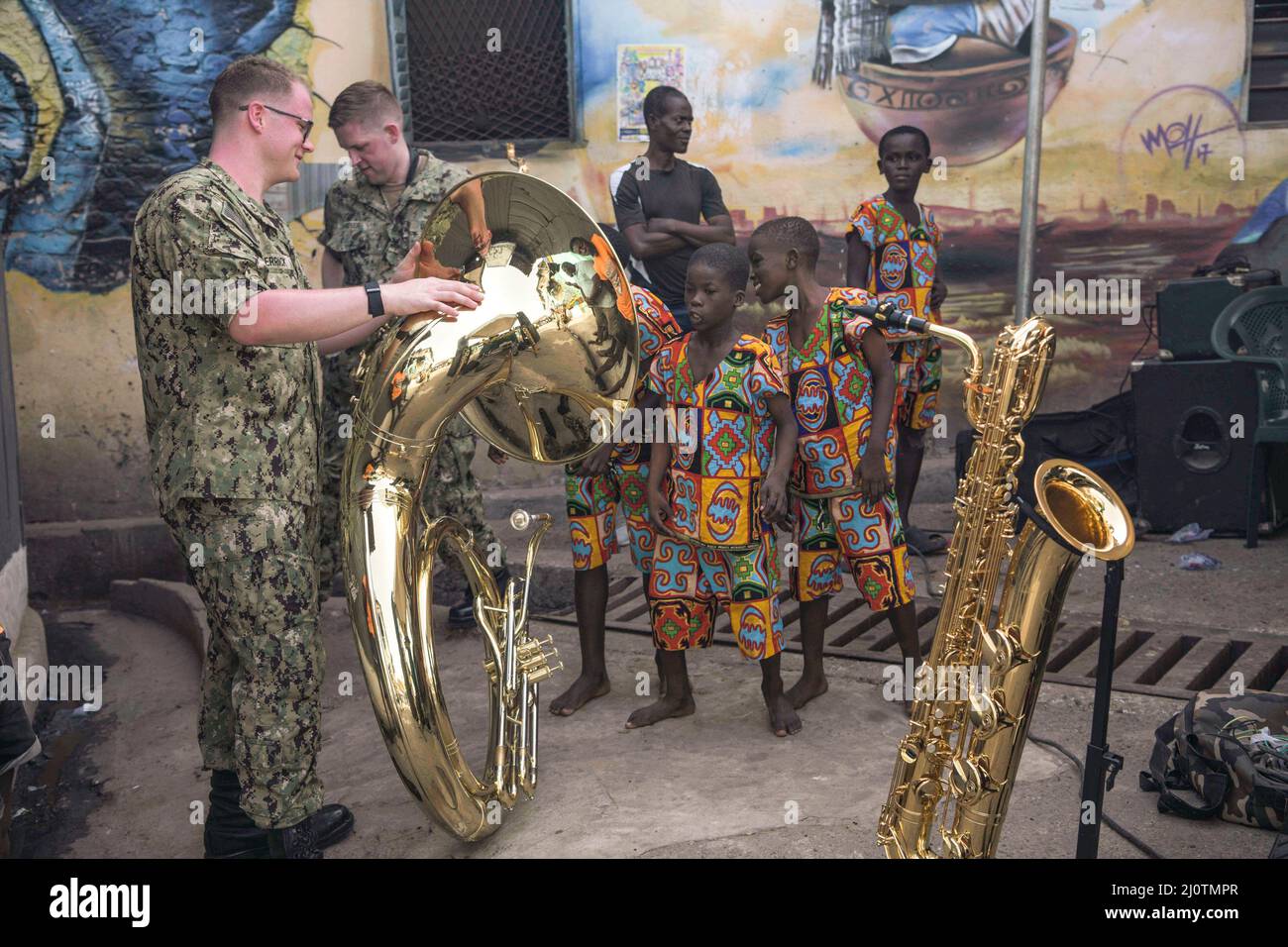 Accra, Ghana. 14th Mar, 2022. Musician 3rd NAME shows his tuba to