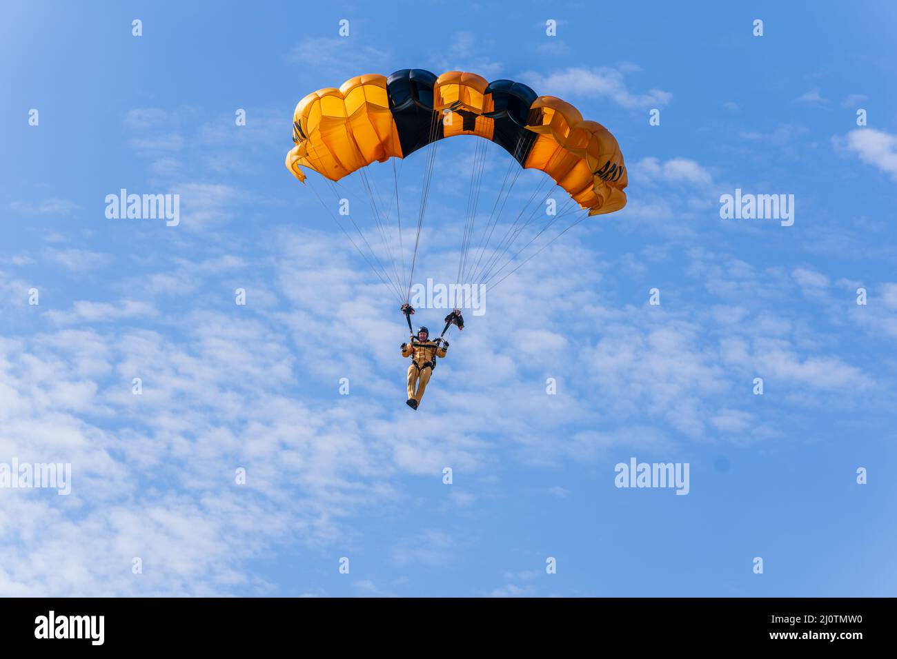 Sgt. 1st Class Chad Riddlebaugh of the U.S. Army Parachute Team lands