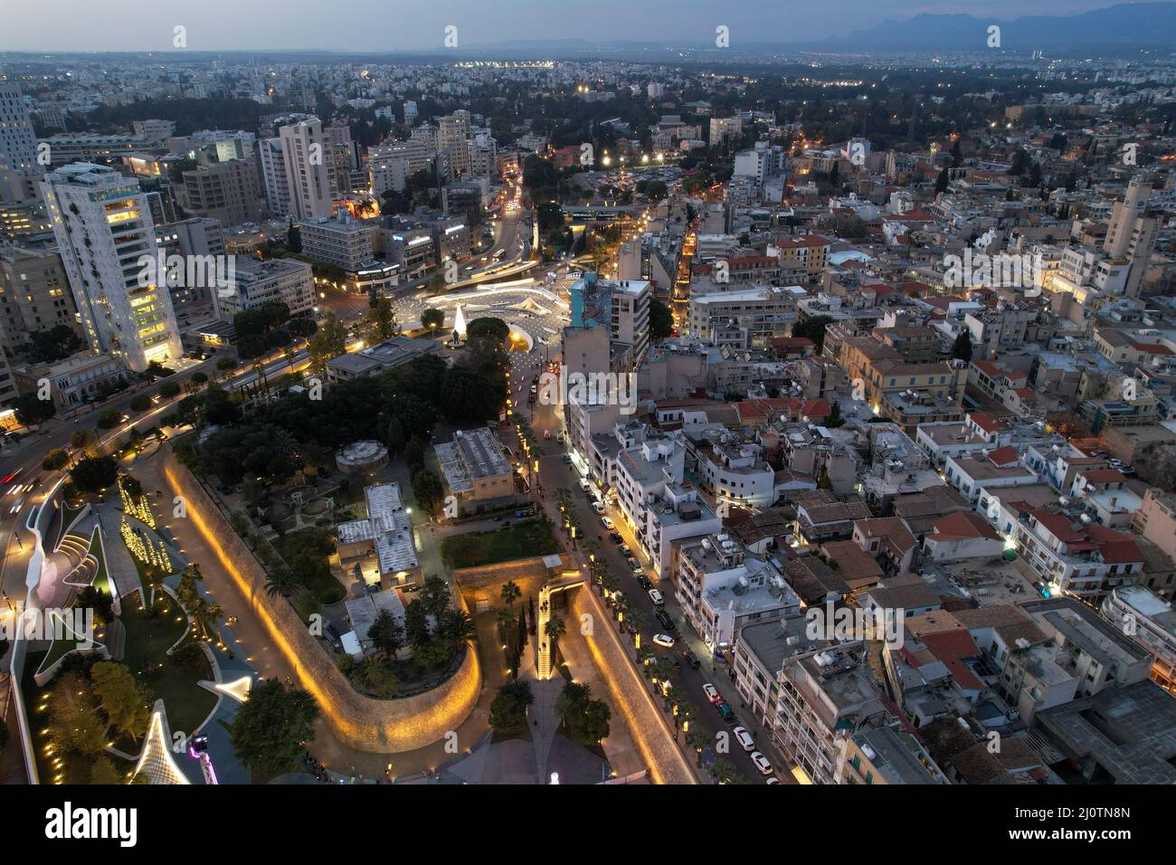 Aerial drone photograph of cityscape of Nicosia in Cyprus at sunset. Stock Photo