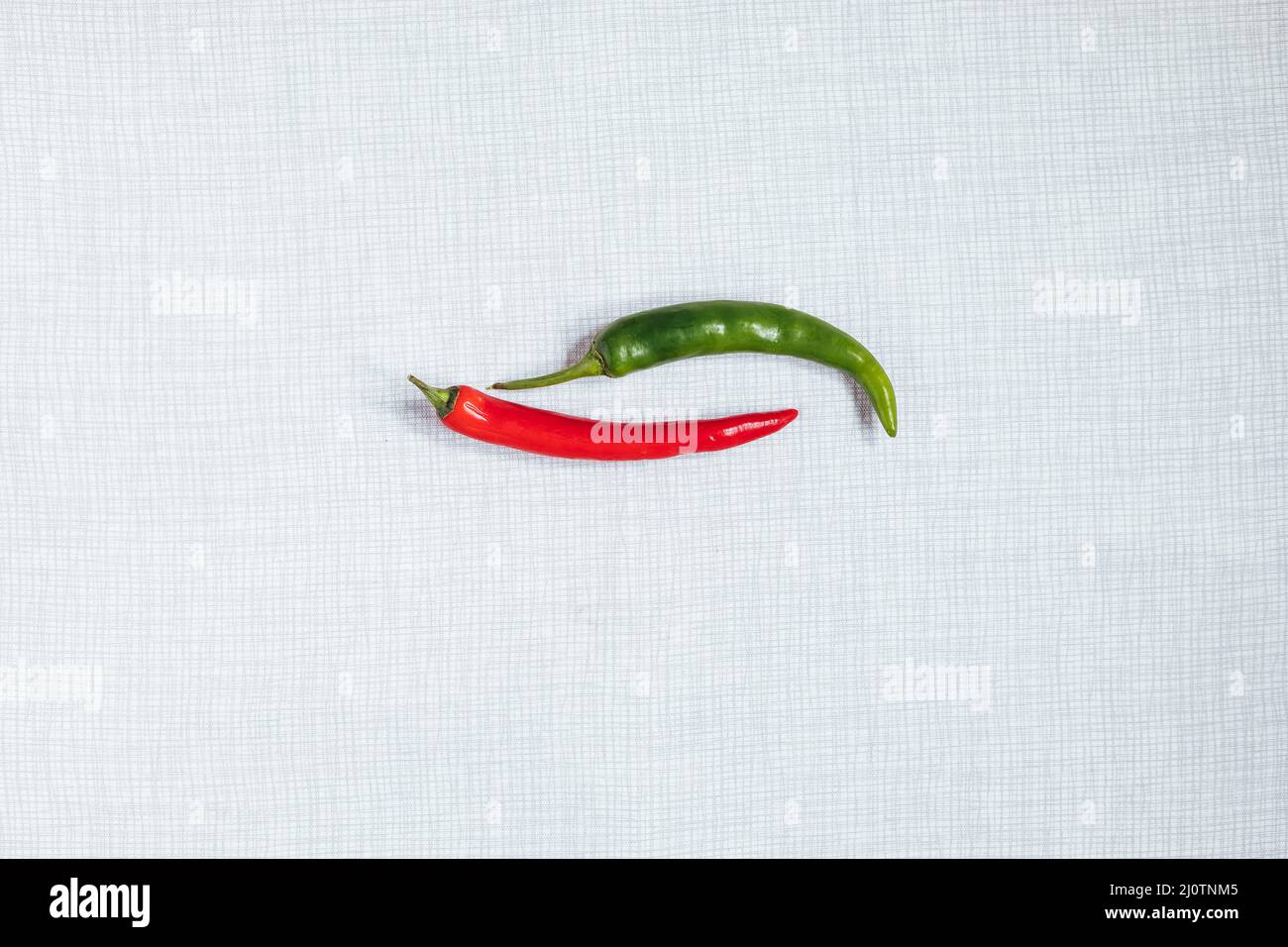 Selection of raw chili peppers. Group of red and green peppers. Hot and