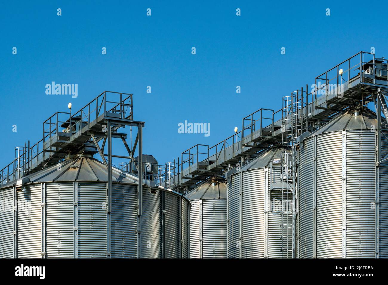 Silo - building for storage and drying of grain crops Stock Photo - Alamy