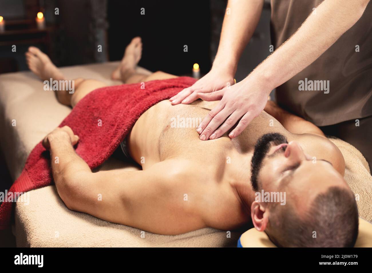 https://c8.alamy.com/comp/2J0W179/a-professional-therapist-massages-the-pectoral-muscle-of-an-athlete-to-a-man-in-a-professional-massage-salon-the-concept-of-pro-2J0W179.jpg