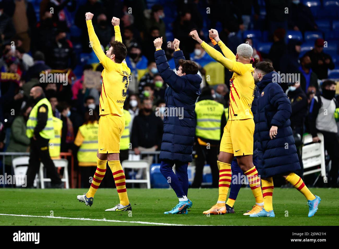 MADRID, SPAIN - MARCH 20: Gerard Pique of FC Barcelona, Ronald Araujo of FC Barcelona celebrating during the Spanish La Liga Santander match between Real Madrid and FC Barcelona at Estadio Santiago Bernabéu on March 20, 2022 in Madrid, Spain (Photo by DAX Images/Orange Pictures) Credit: Orange Pics BV/Alamy Live News Stock Photo