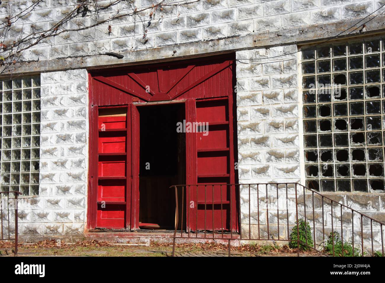 Door hangs open on abandoned funeral home in ghost town called Pepper