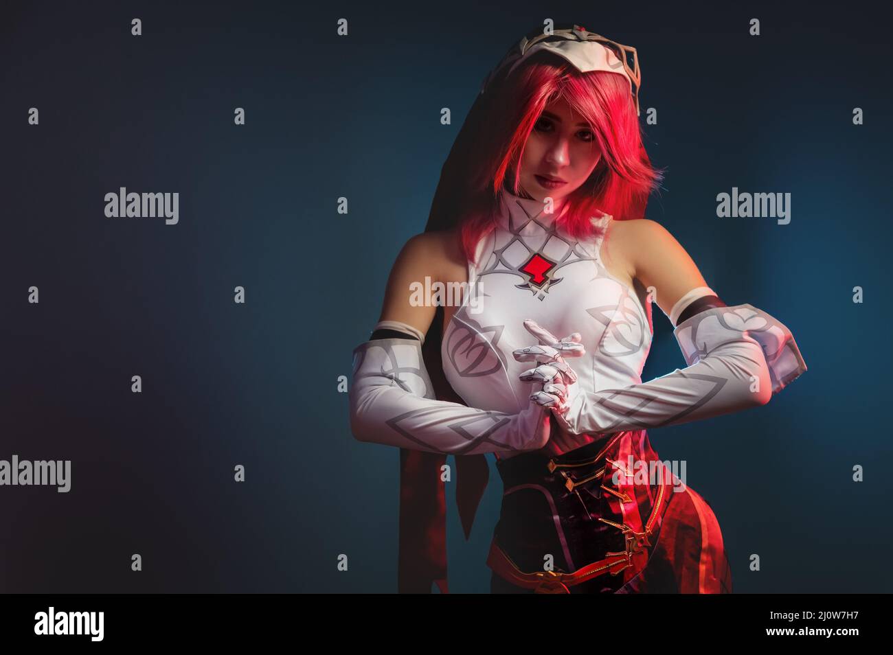 Cosplay portrait of attractive sexy Caucasian young woman in manga anime costume. Portrait of a costume character rosary Stock Photo