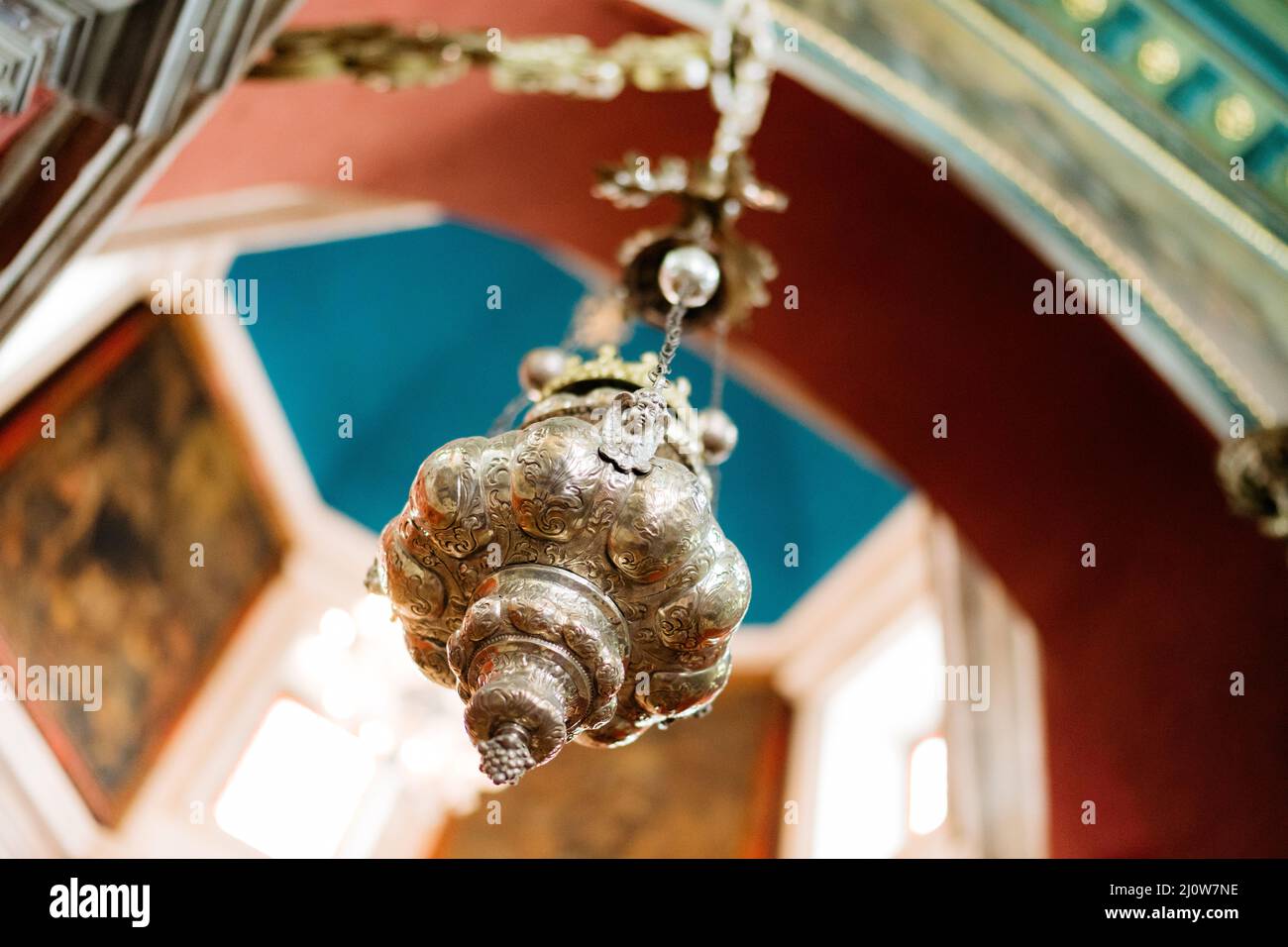Censer hangs from a chain in the Church of Our Lady of the Rocks Stock Photo