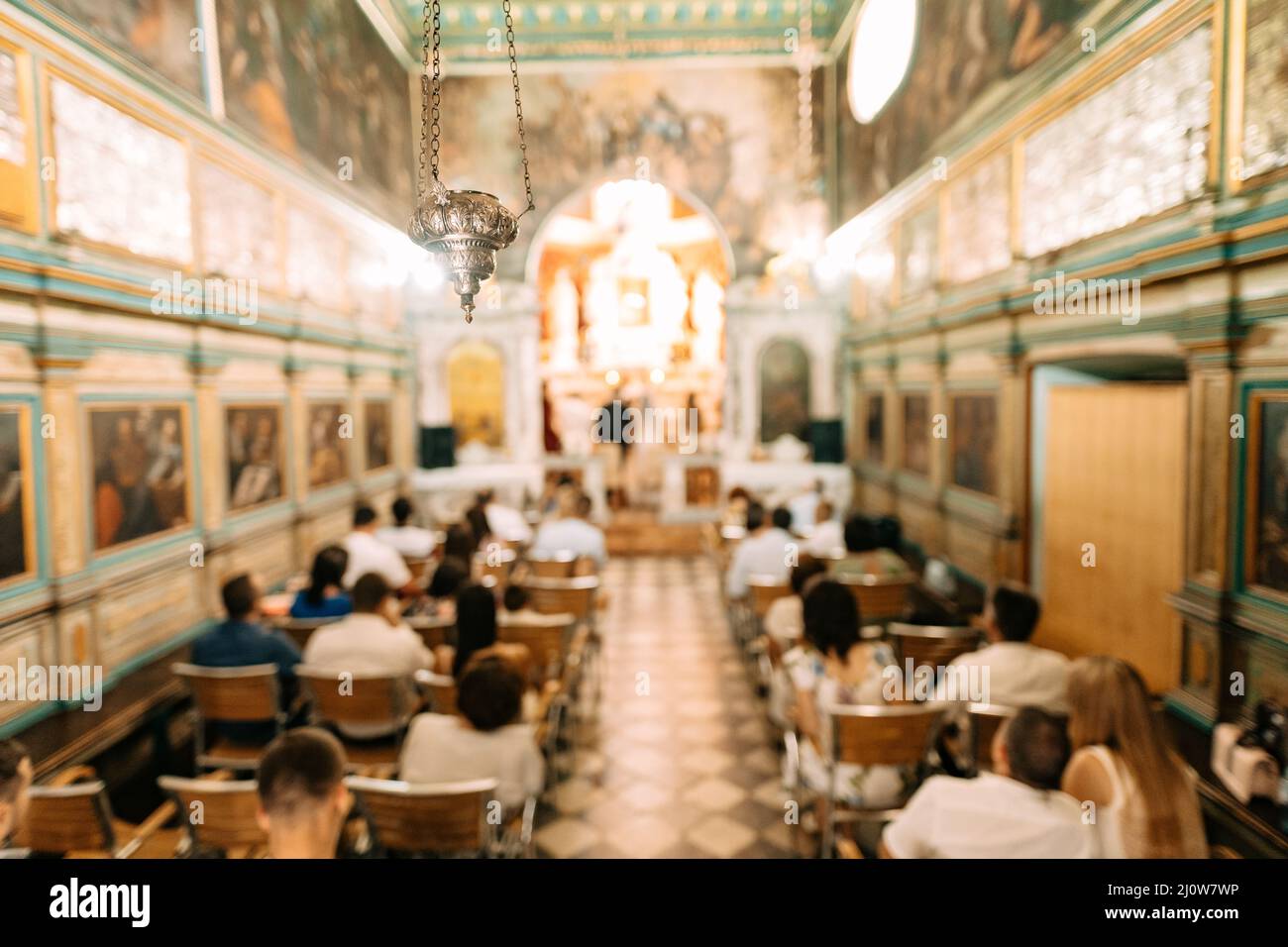 Censer hangs from the ceiling in a church during a divine service Stock Photo