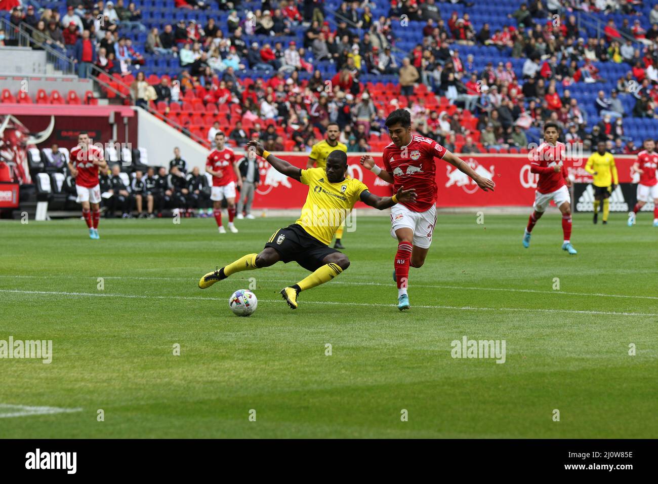 Harrison, United States . 20th Mar, 2022. Omir Fernandez (21, New York Red Bulls) and Jonathan Mensah (4, Columbus Crew) in action during the Major League Soccer game between New York Red Bulls and Columbus Crew at Red Bull Arena in Harrison, New Jersey Katelin Severino/SPP Credit: SPP Sport Press Photo. /Alamy Live News Stock Photo
