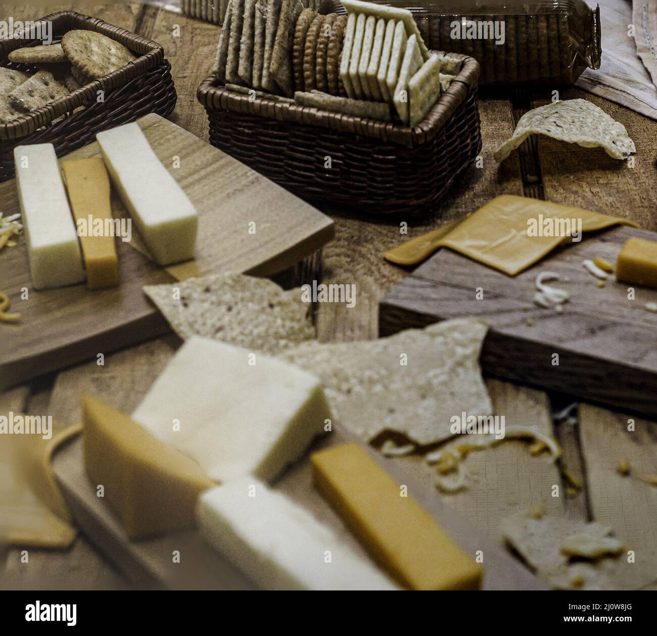 Cheese and crackers spread on table. Stock Photo