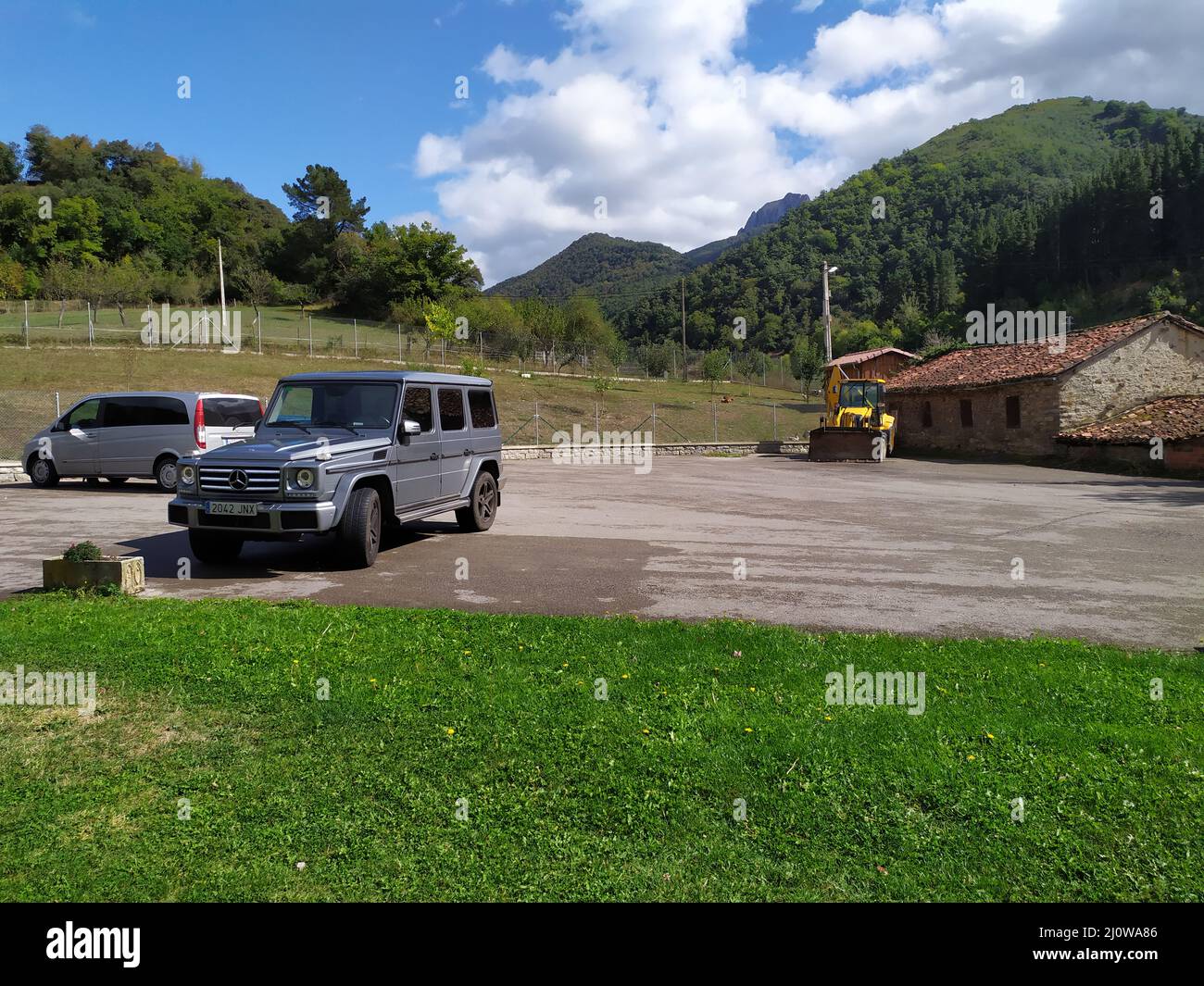 Luxury off-road car parked on the street. Mercedes Benz G-Class gray ...
