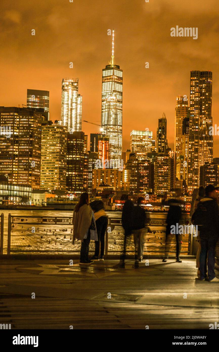 Manhattan and Brooklyn bridge night view and the people Stock Photo