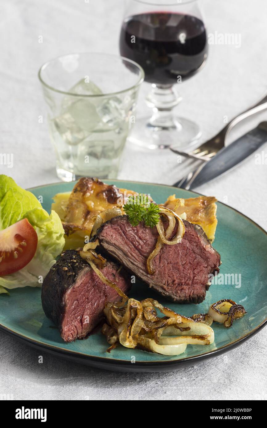 Roast beef and onions Stock Photo