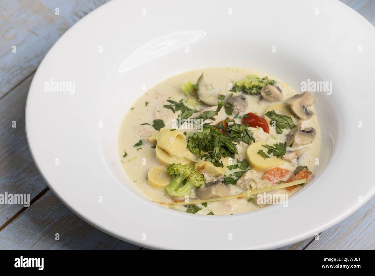 Thailand coconut soup on wood Stock Photo