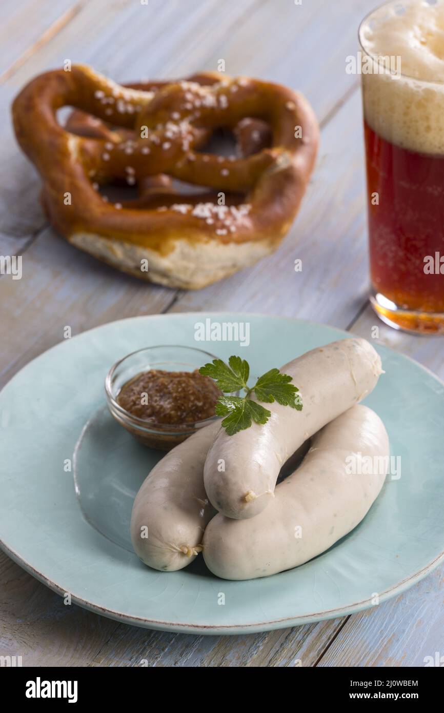 Bavarian white sausages with pretzel Stock Photo