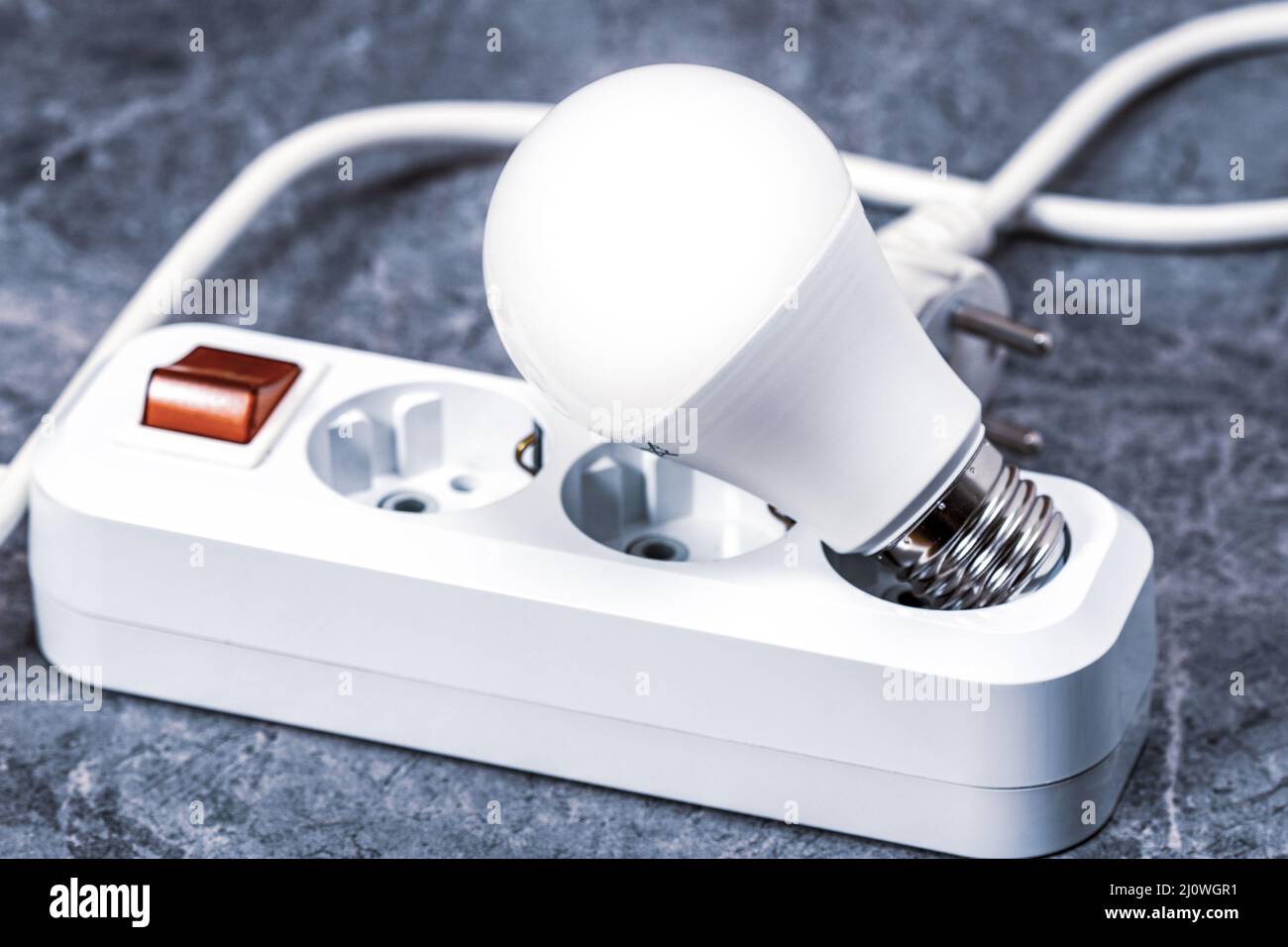 Electrical extension cord and light bulb Stock Photo Alamy