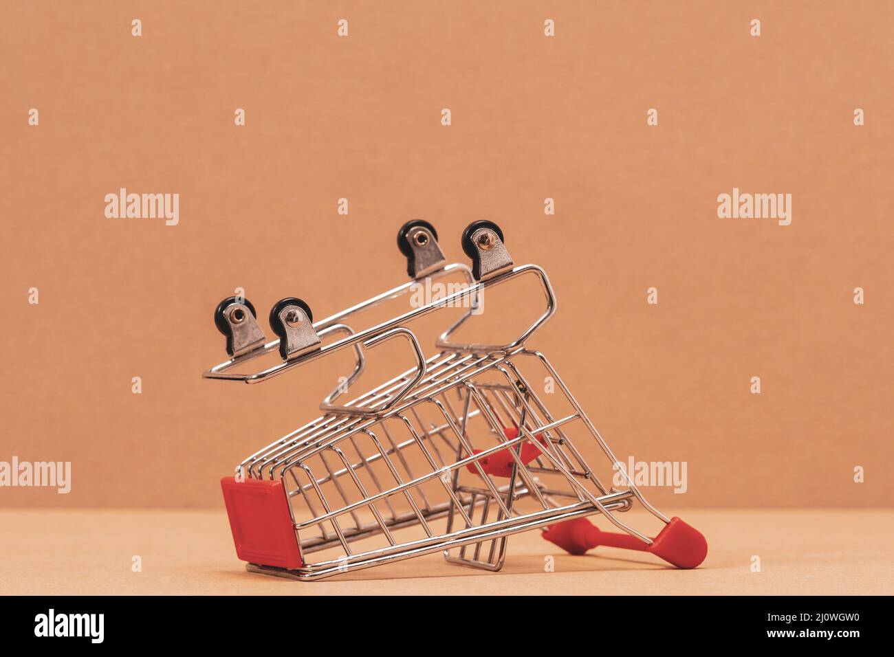 Shopping cart is upturned Stock Photo