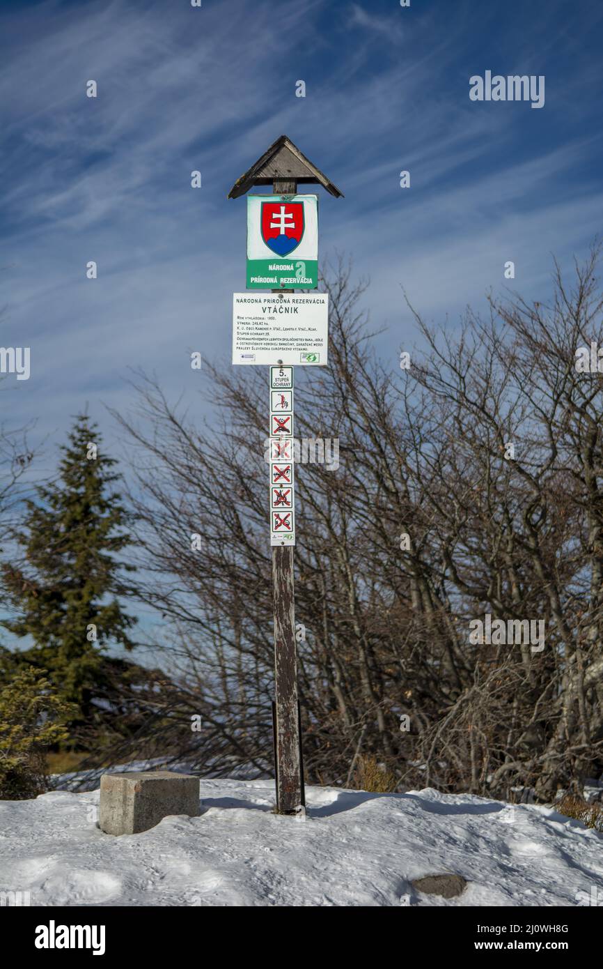 National nature reserve information board sign at the summit of Vtacnik peak, Slovakia. Altitude of 1346 metres above sea level. Stock Photo