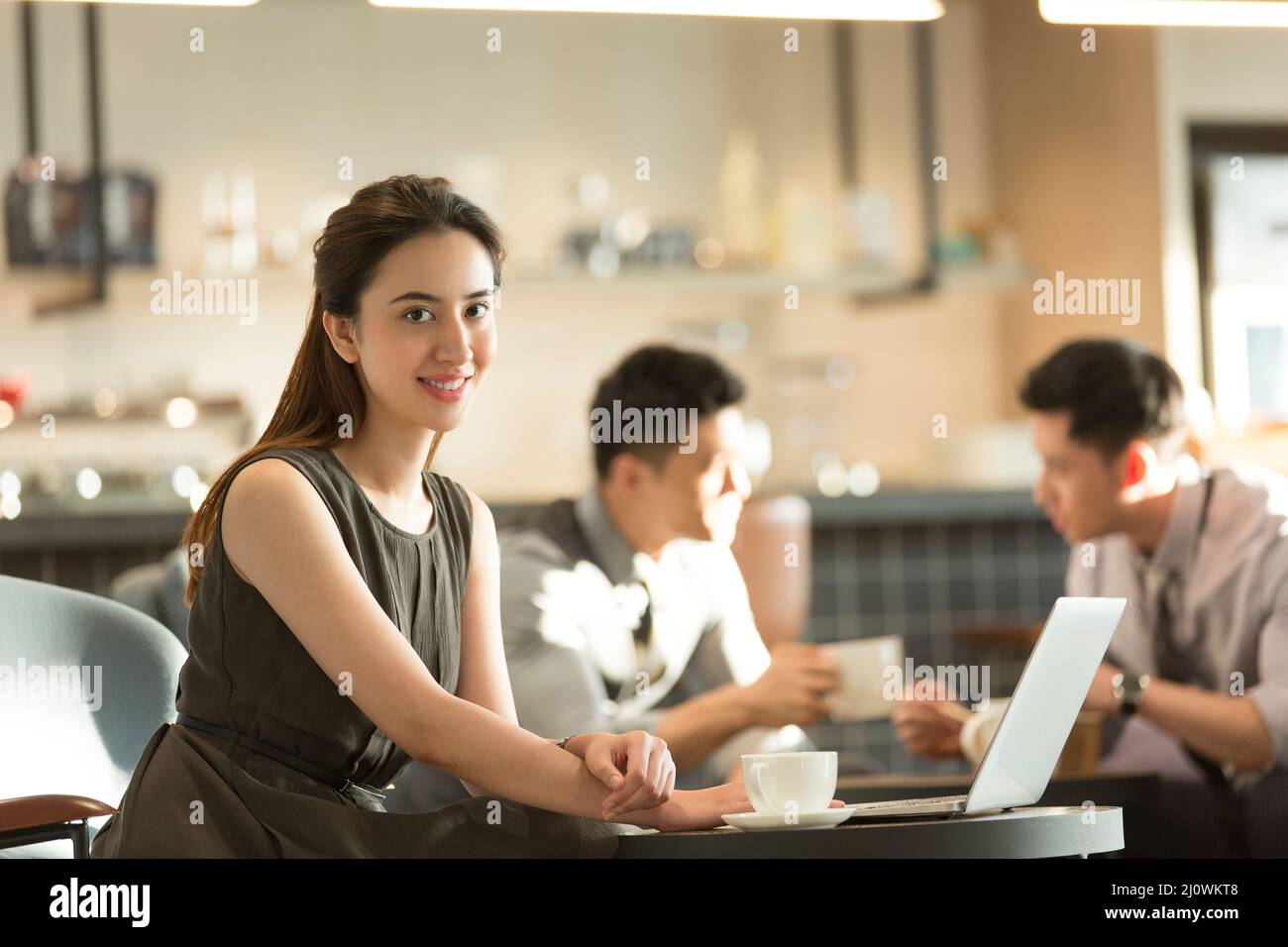 Chinese woman work in cafe Stock Photo