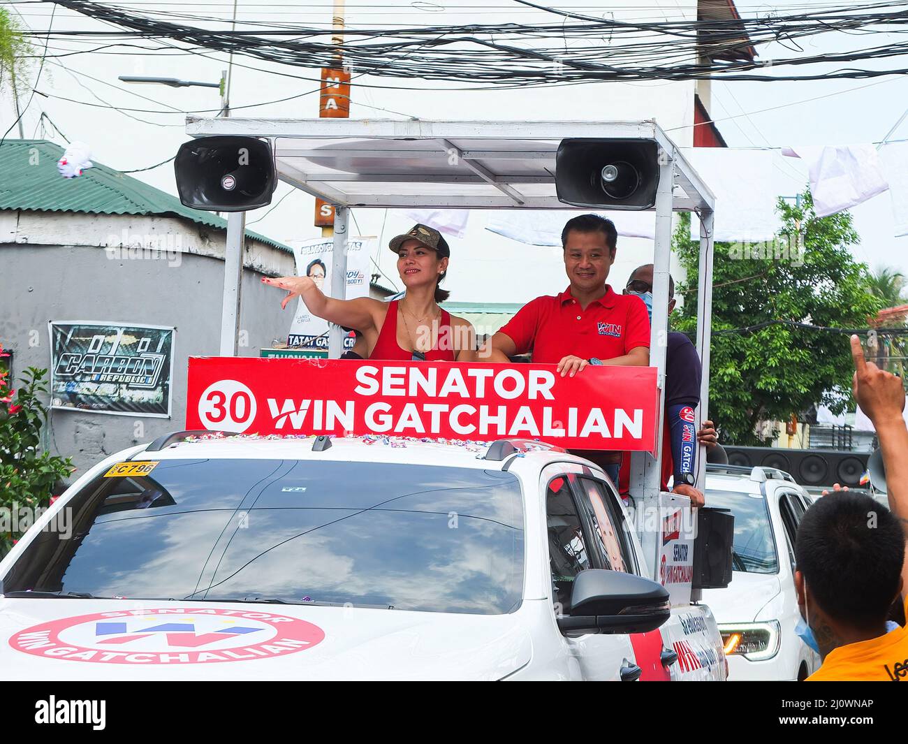 Senator Sherwin 'Win' Gatchalian together with his girlfriend former Binibining Pilipinas Universe 2009 winner and actress Bianca Manalo waves to the crowd. Bongbong Marcos Jr. visits the cities of Navotas and Malabon, as part of UniTeam's northern Metro Manila campaign sorties. He is the only son of former Philippine strong man, President Ferdinand Marcos Sr. and former first lady Imelda Romualdez Marcos. BBM, an acronym of Marcos Jr., is eyeing the highest seat of power in the land, the presidency. As he keeps his lead in presidential poll surveys, His dream is providing unifying leadership Stock Photo