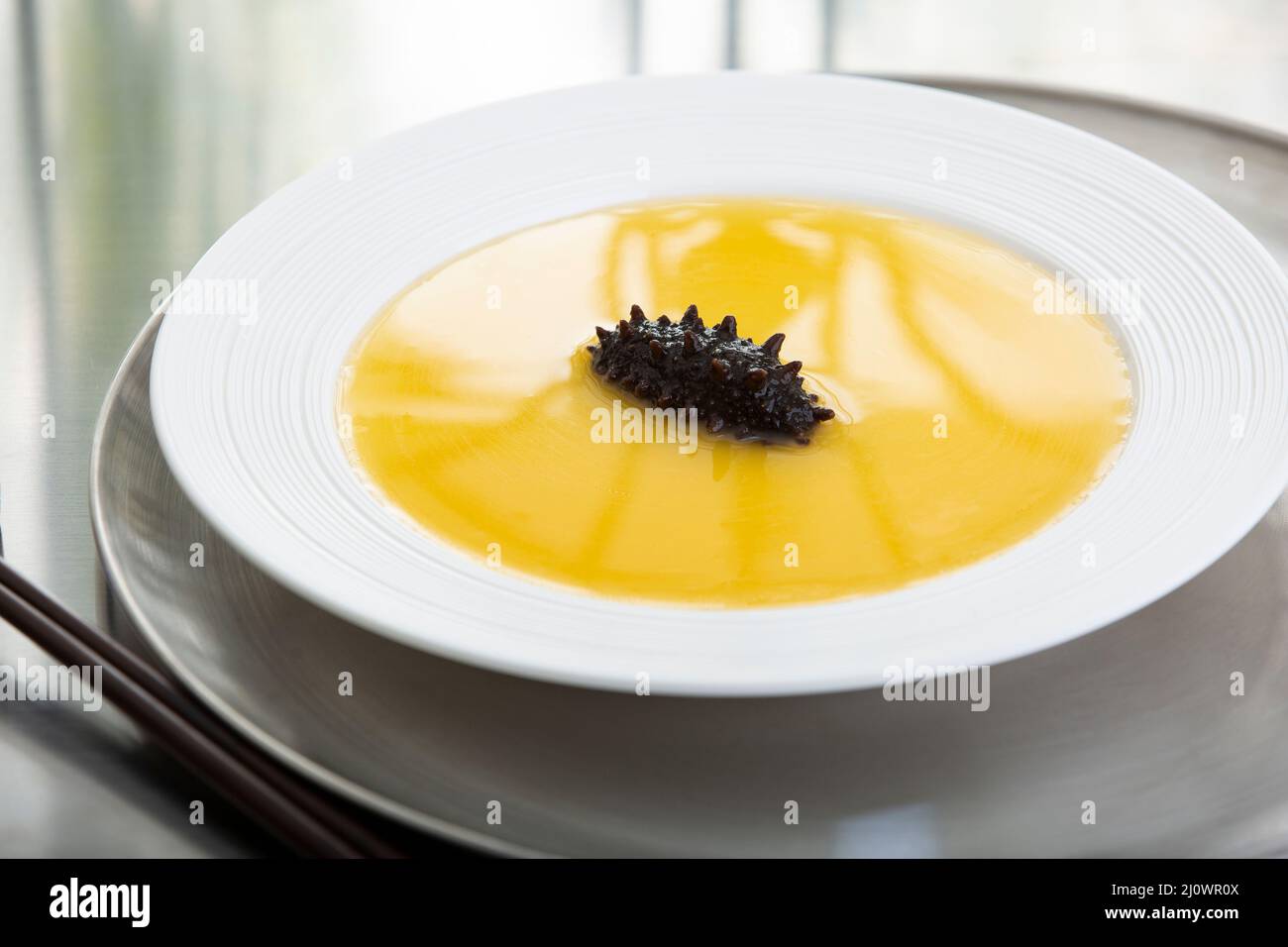 Cantonese Cuisine,Sea cucumber soup in a bowl Stock Photo Alamy