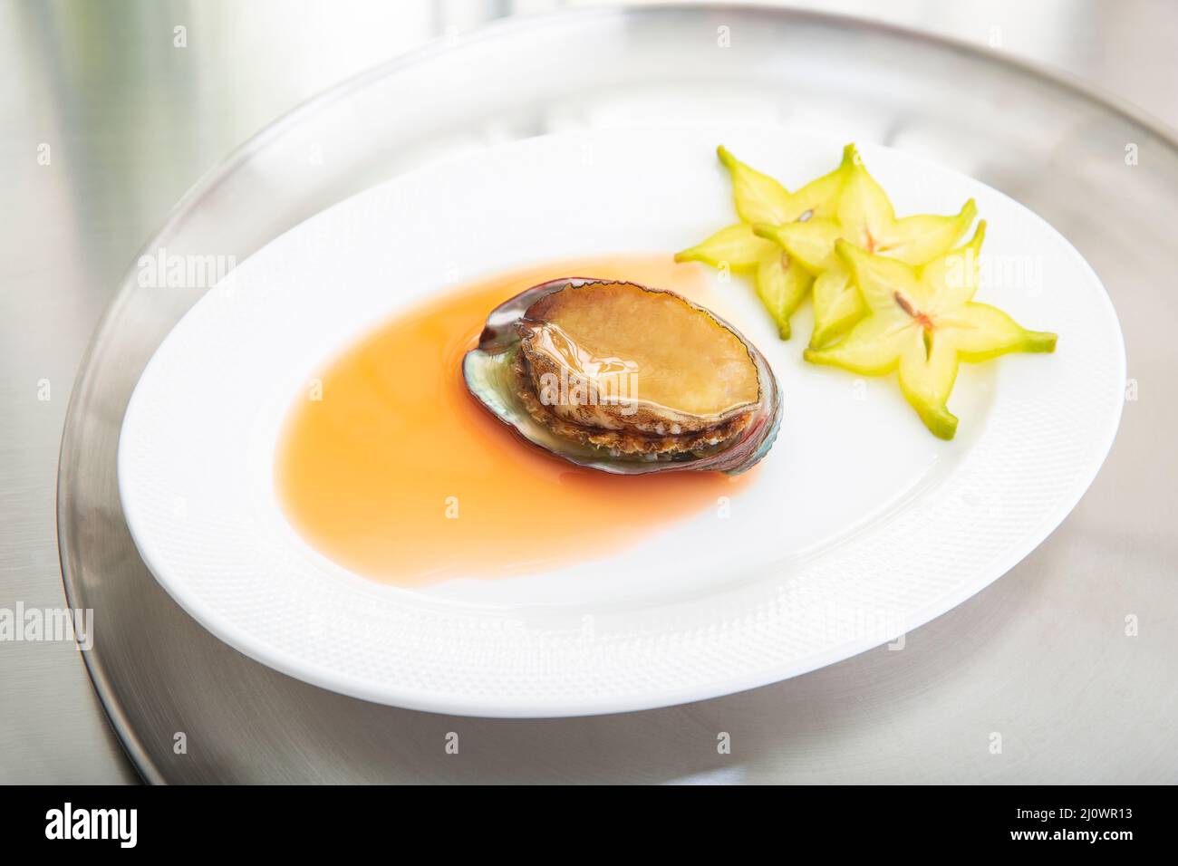 Cantonese Cuisine,Abalone in brown sauce Stock Photo