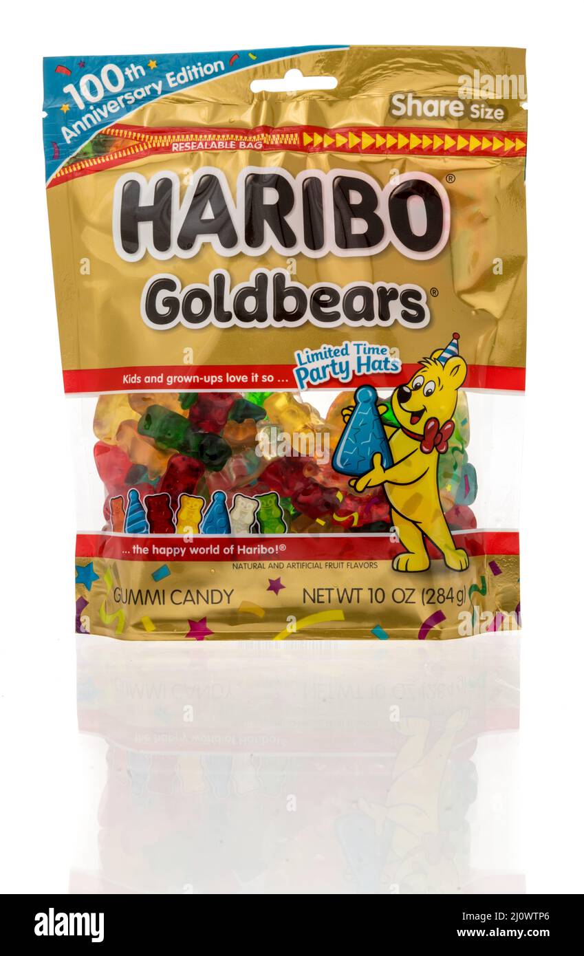 Winneconne, WI -18 March 2021: A package of  Haribo goldbears limited edtition 100th anniversary edtion with party hats on an isolated background Stock Photo