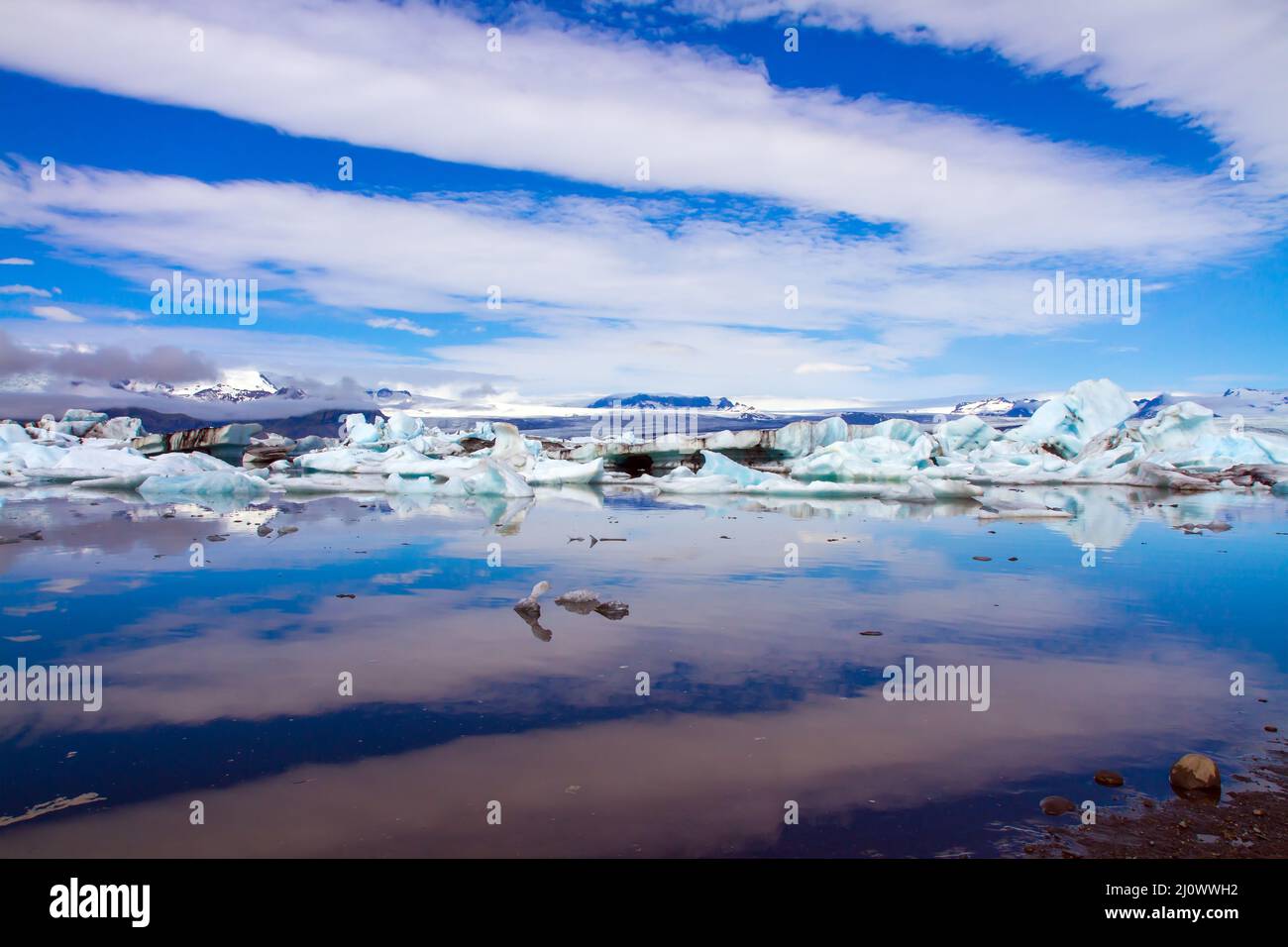 White and blue icebergs and ice floes Stock Photo
