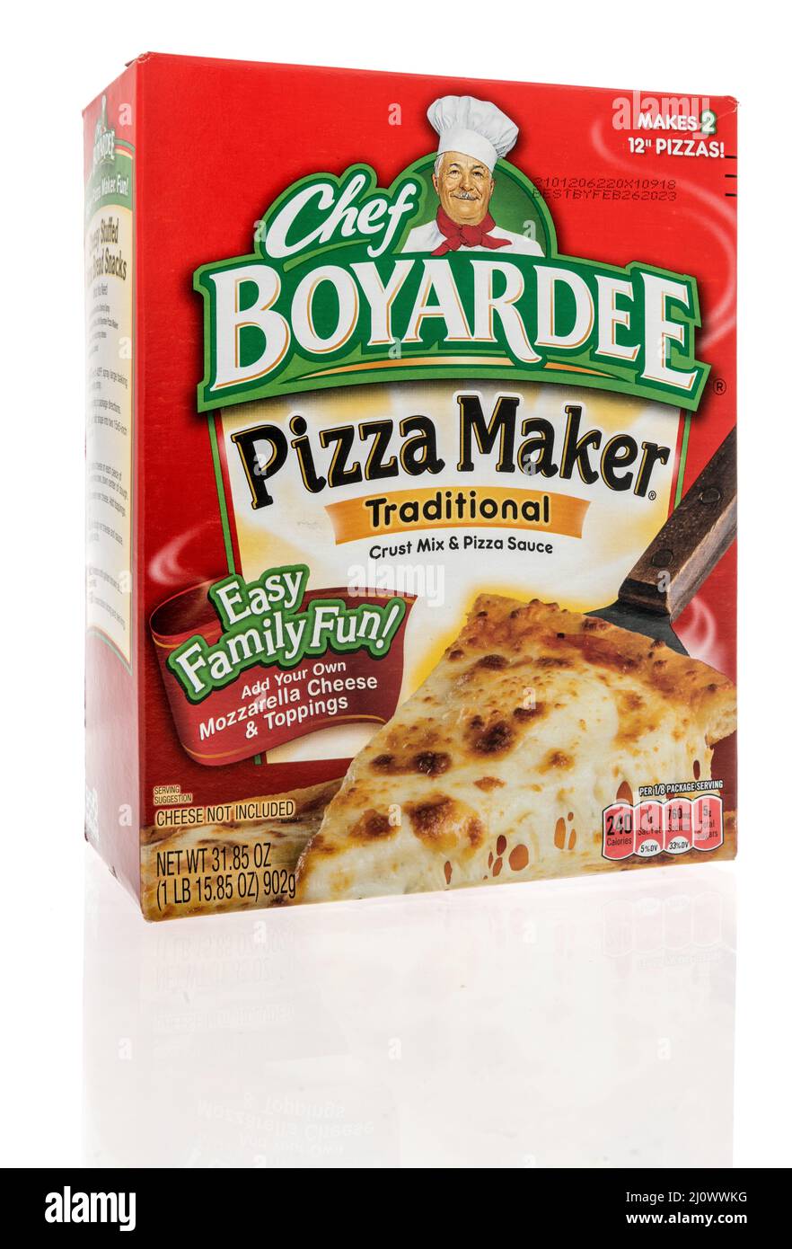 Winneconne, WI -19 March 2021: A package of Chef Boyardee pizza maker crust mix and pizza sauce on an isolated background Stock Photo