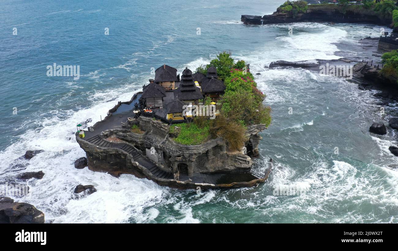 Tanah Lot Temple on the rock in Sea. Ancient hinduism place of worship ...