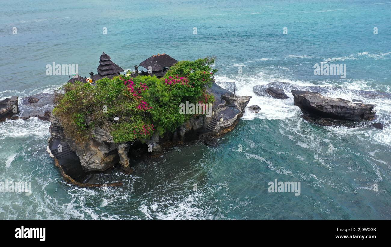 Tanah Lot Temple on the rock in Sea. Ancient hinduism place of worship ...