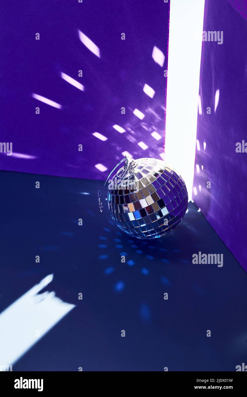 Disco mirror balls light reflections on ceiling and floor Stock Photo