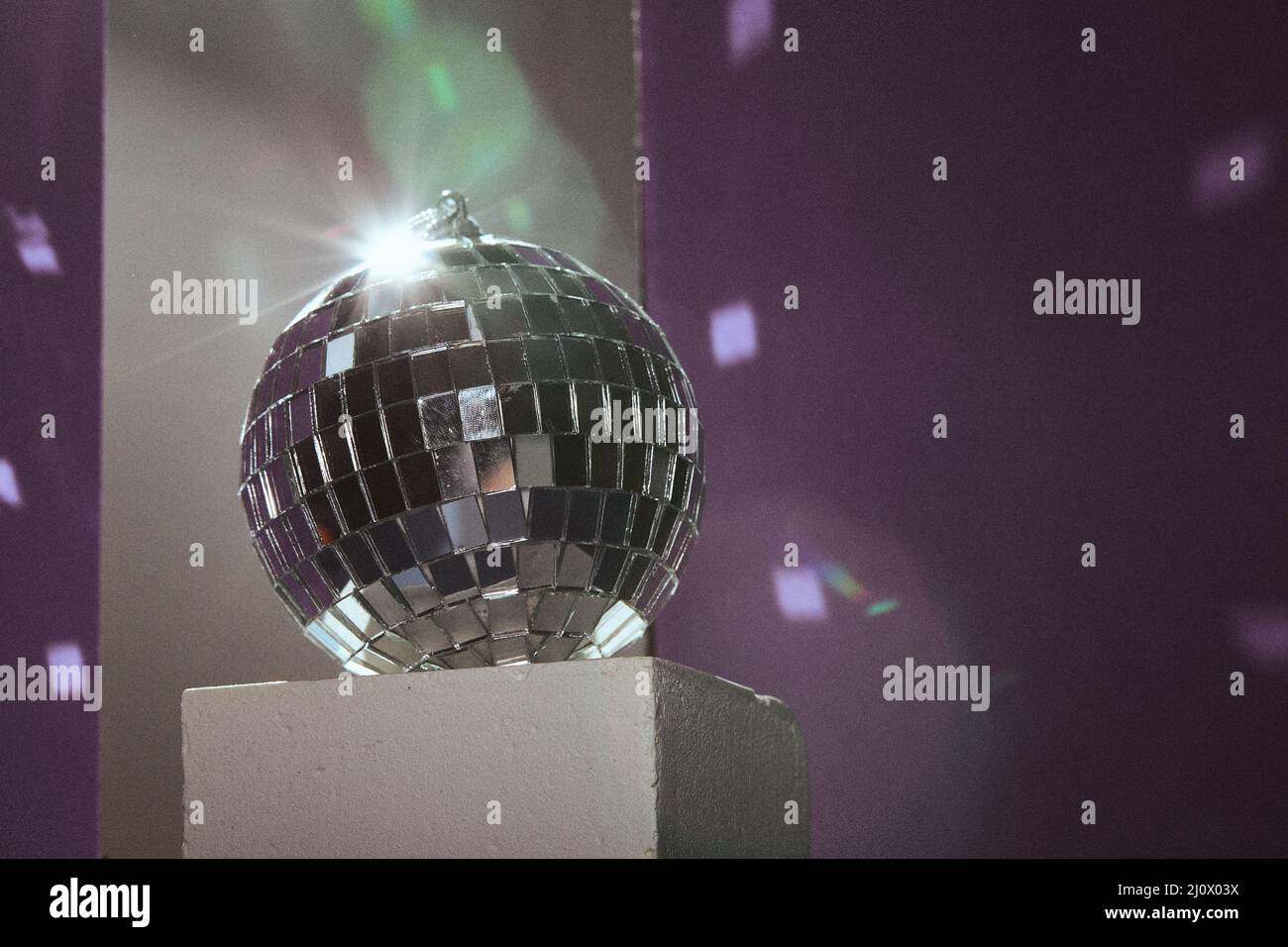 Disco mirror balls light reflections on ceiling and floor Stock Photo