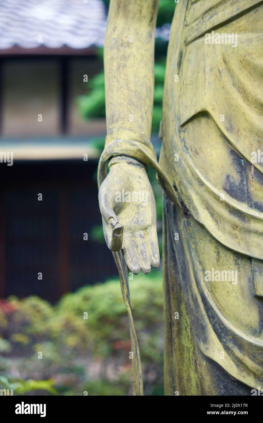 The right hand of Goddess Benzaiten in Varada mudra. Toganji temple. Nagoya. Japan Stock Photo