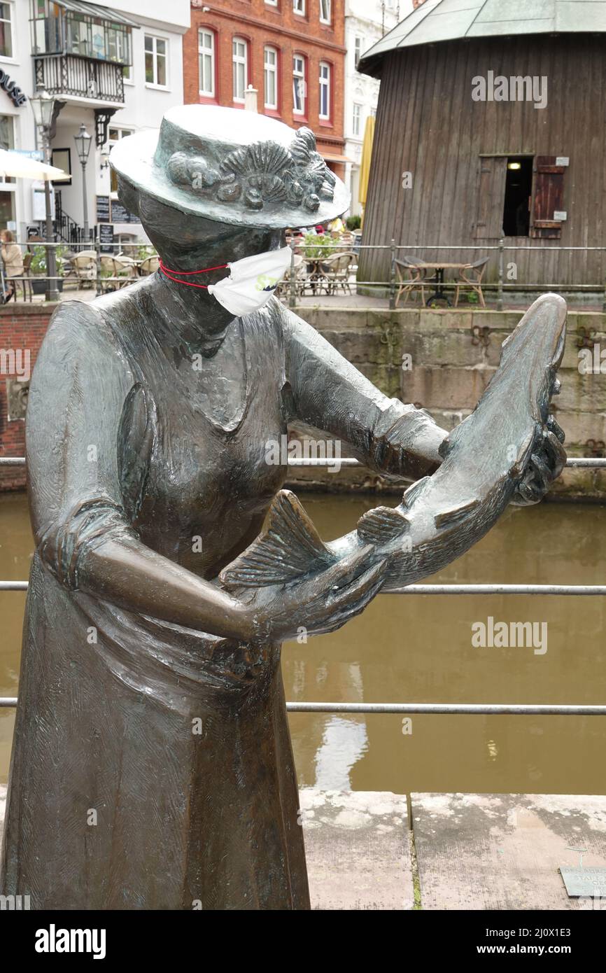 Statue of a fish seller at the fish market in Stade Stock Photo - Alamy
