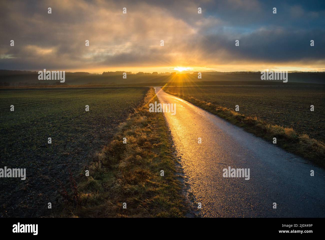 Nice sunset at a view over landscape Stock Photo