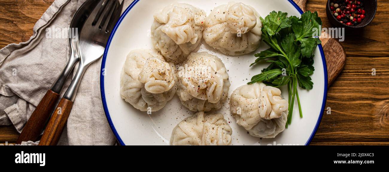 Khinkali, traditional dish of Georgian Caucasian cuisine, dumplings filled with ground meat Stock Photo