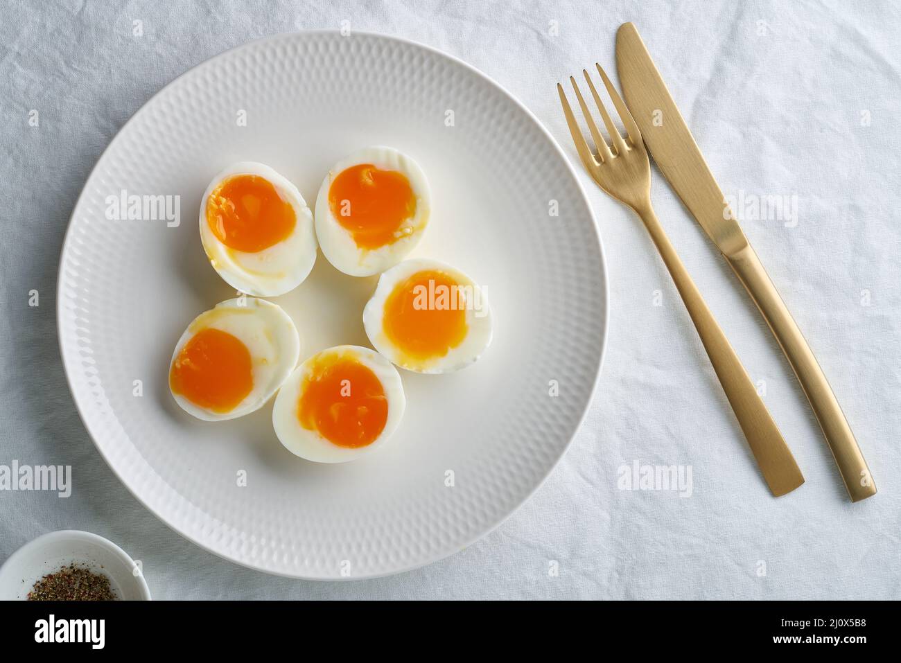 Soft boiled egg cut open yolk white cut out cut-out Stock Photo - Alamy