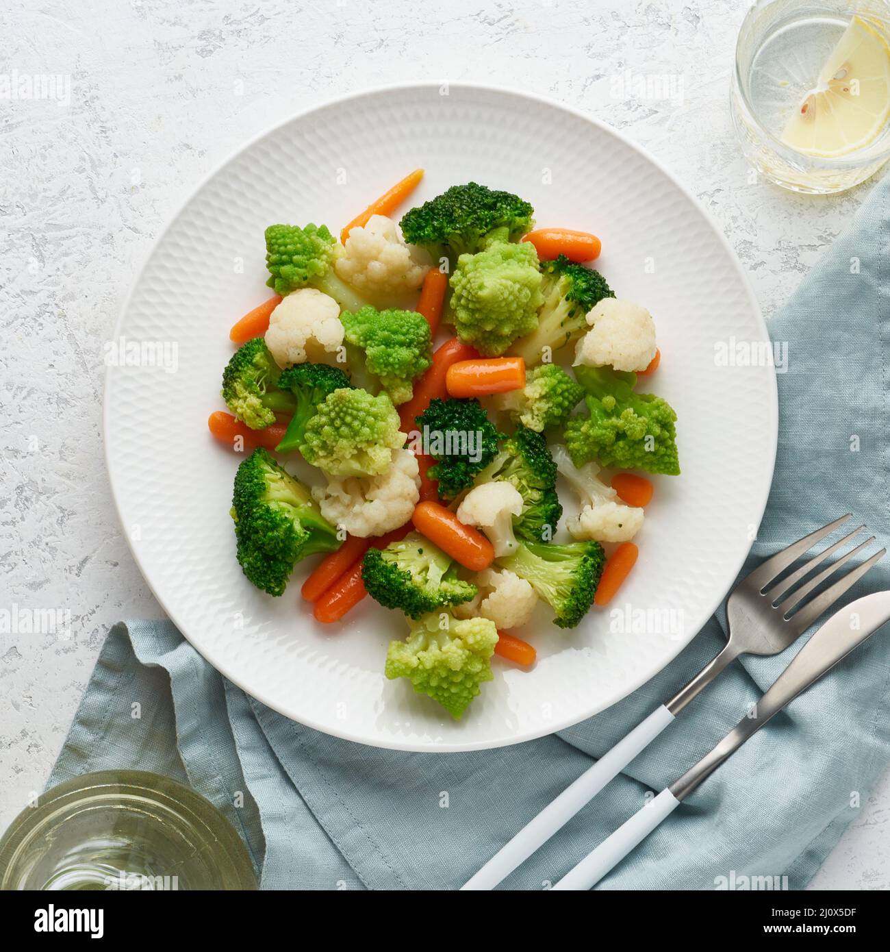 Mix of boiled vegetables. Broccoli, carrots, cauliflower. Steamed vegetables for lowcalorie