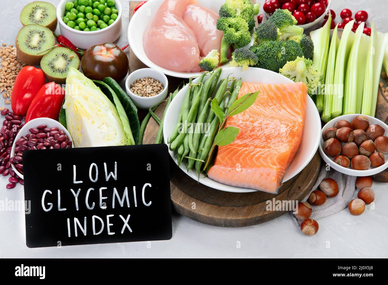 Foods with low glycemic index on gray background. Healthy food concept. Stock Photo
