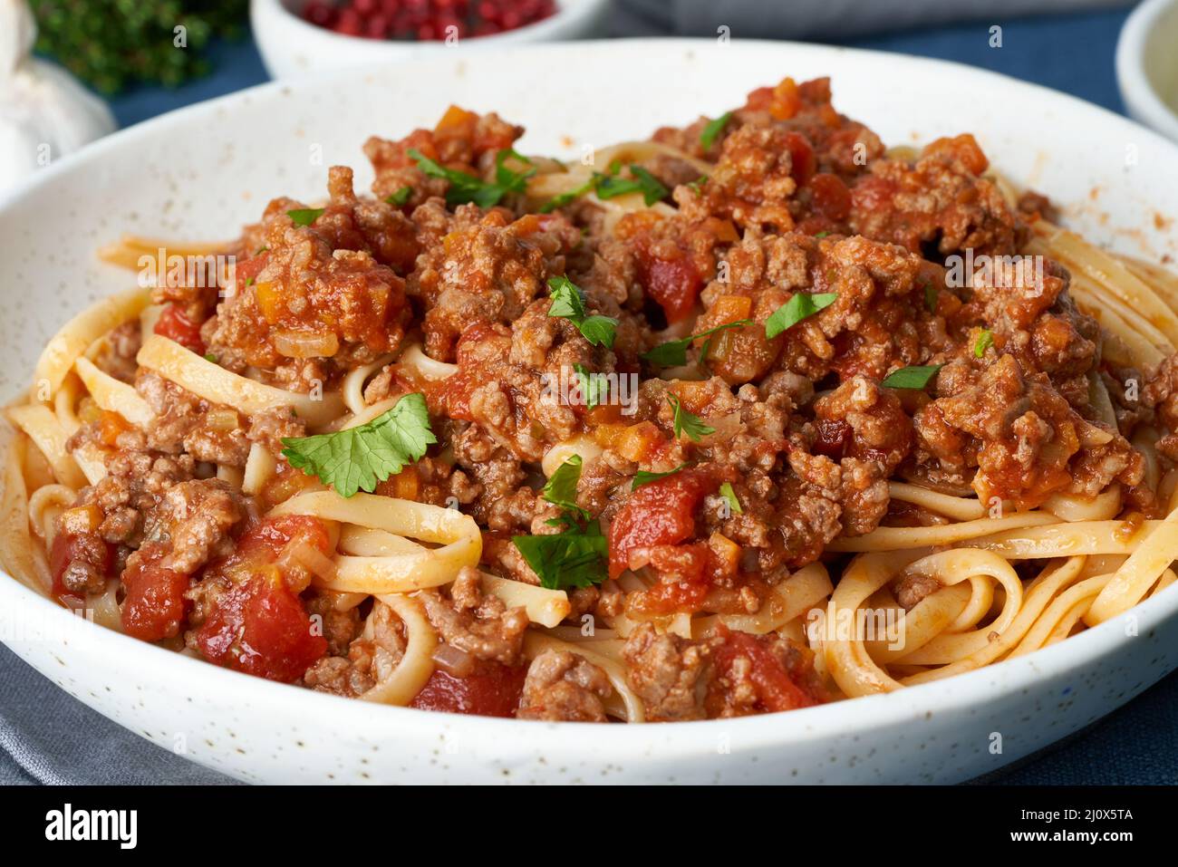 Pasta Bolognese Linguine with mincemeat and tomatoes, parmesan cheese