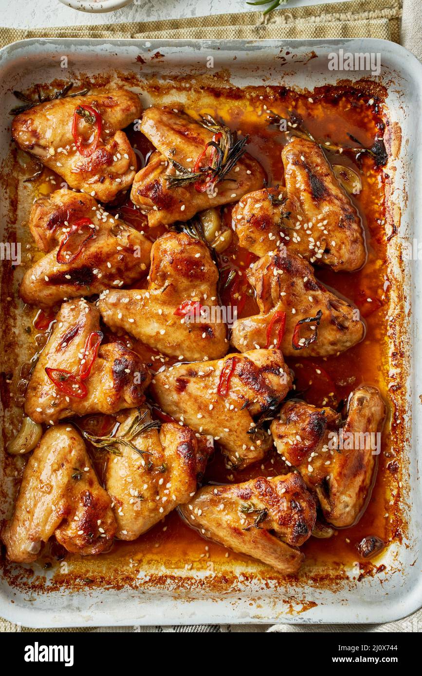 Barbecue chicken wings. Sticky asian spicy wings with teriyaki. ven