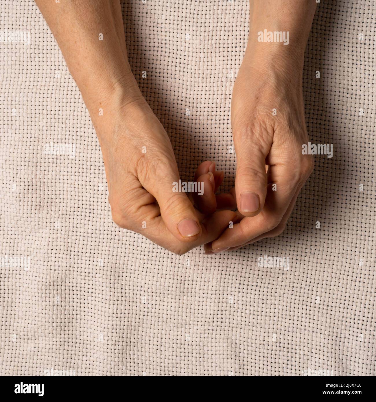 The hands of an elderly woman. High quality photo Stock Photo