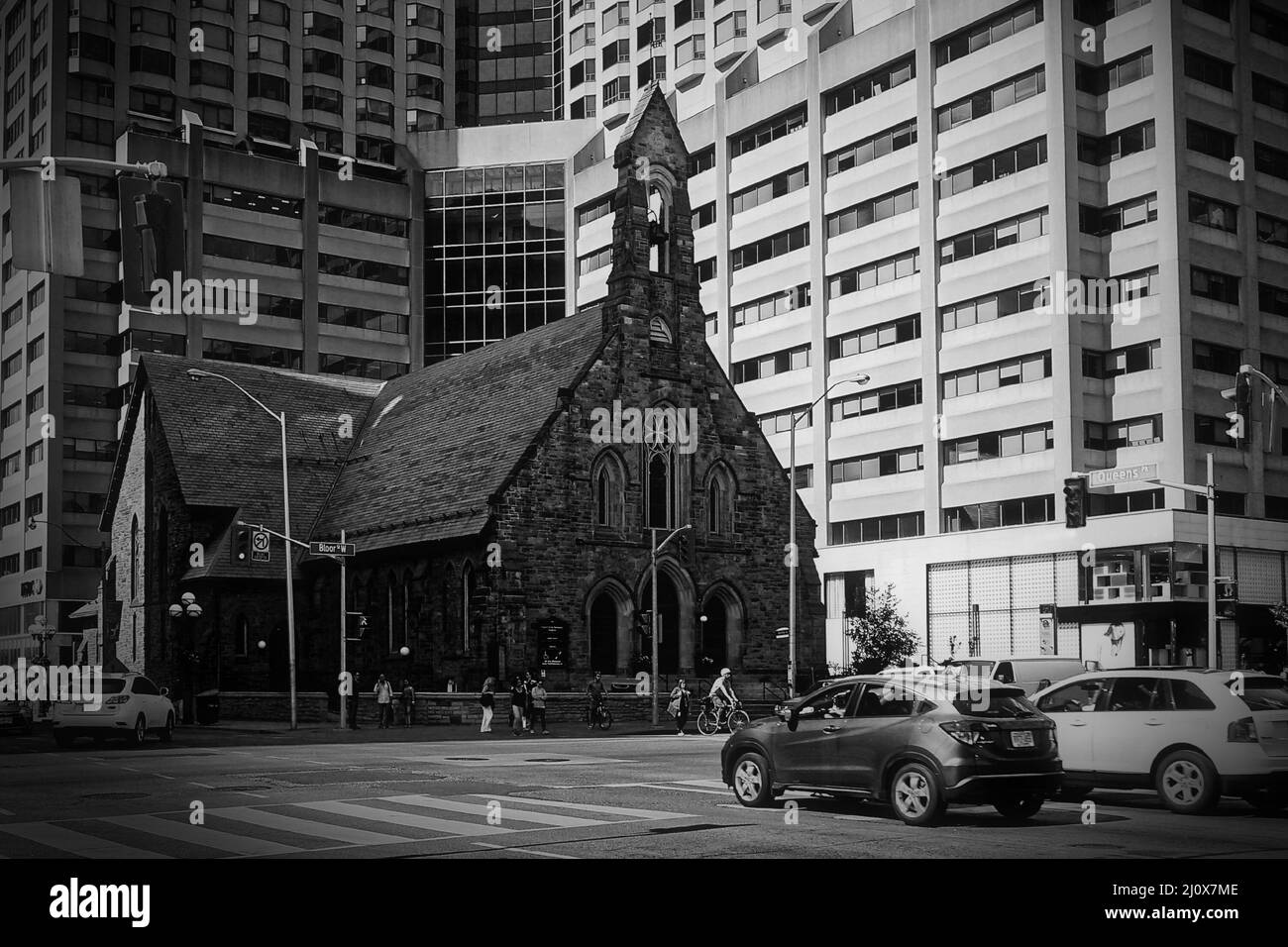 Summer view on Bloor street West and Avenue Road junction with an old