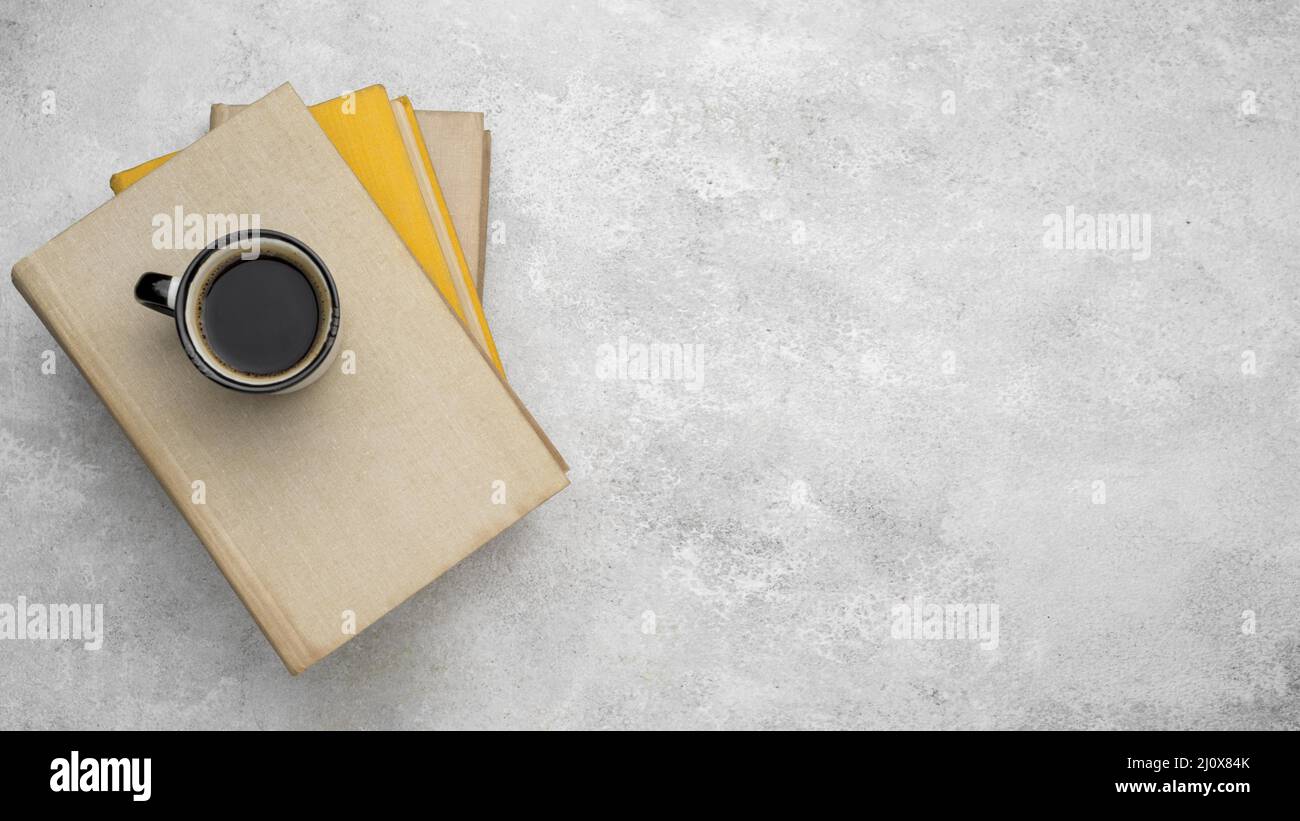 Top view hardback books table with coffee copy space. High quality beautiful photo concept Stock Photo