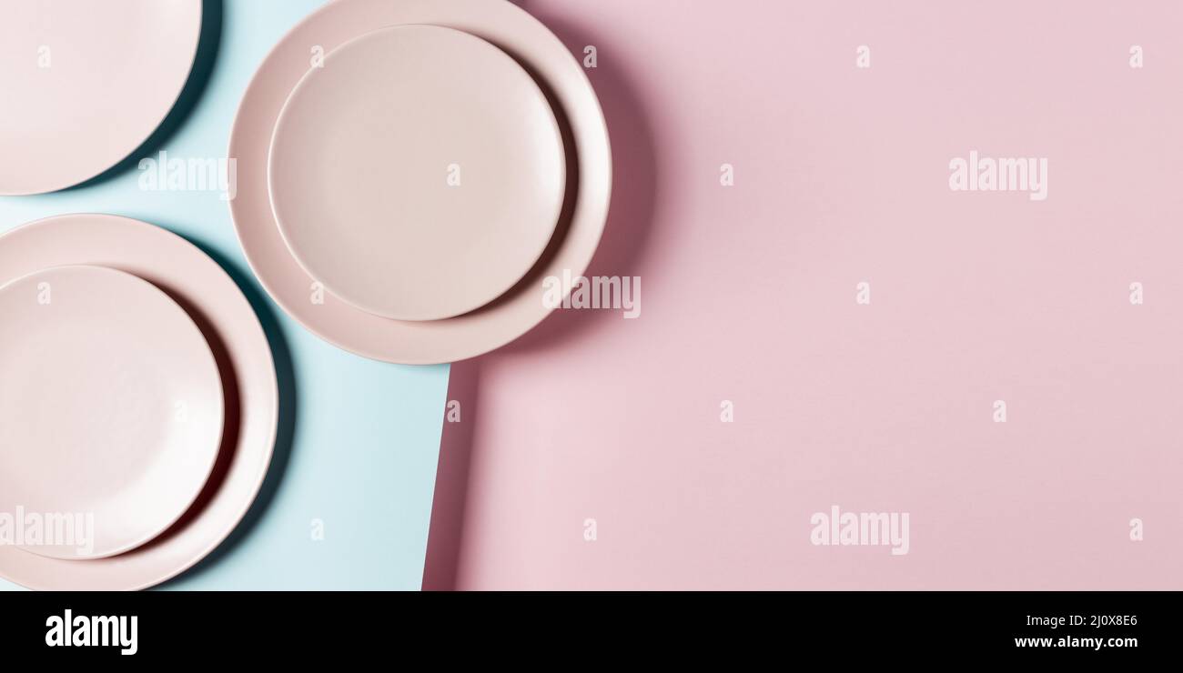 Pink plates arrangement with copy space. High quality beautiful photo concept Stock Photo