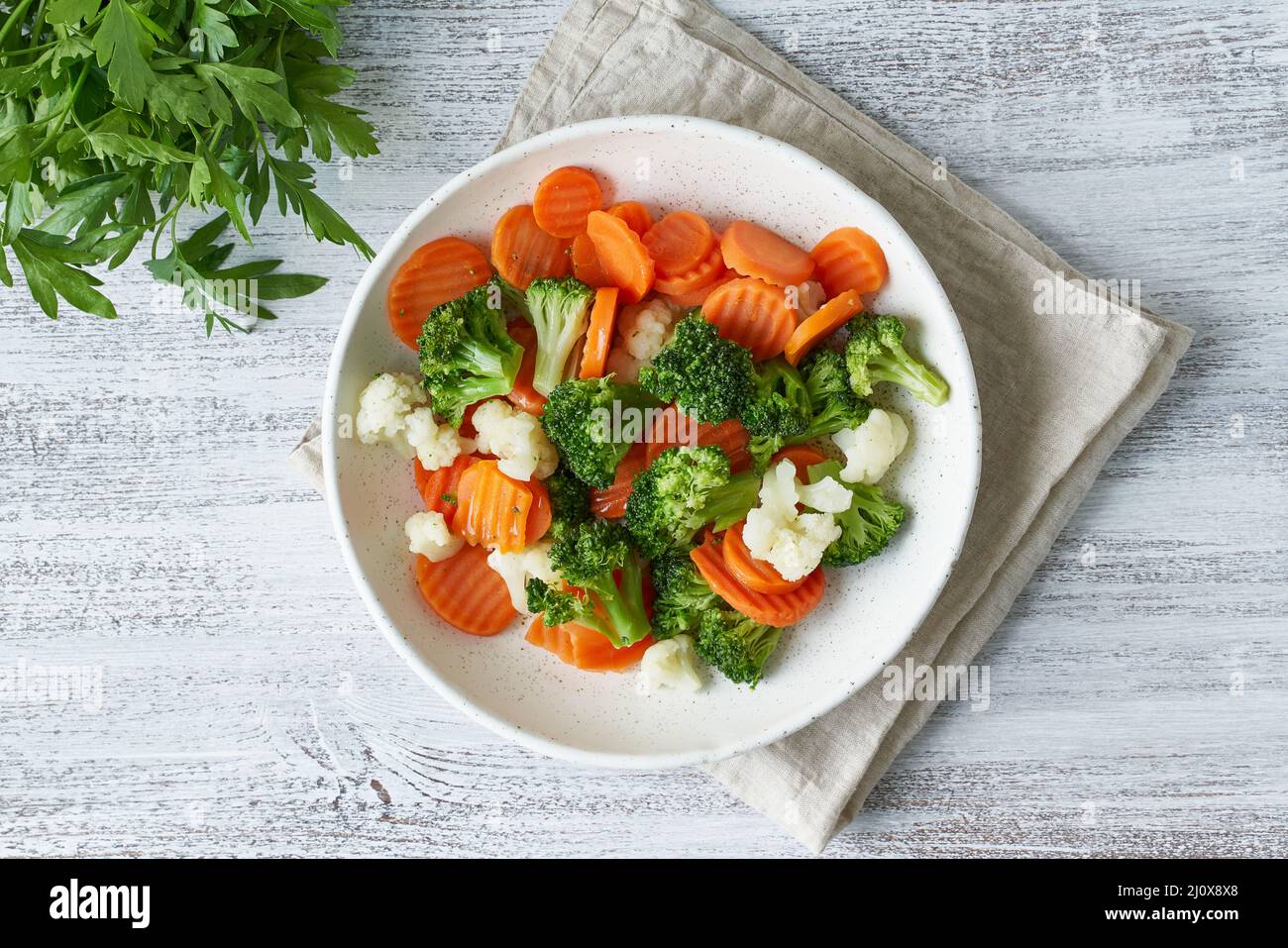 Mix of boiled vegetables. Broccoli, carrots, cauliflower. Steamed