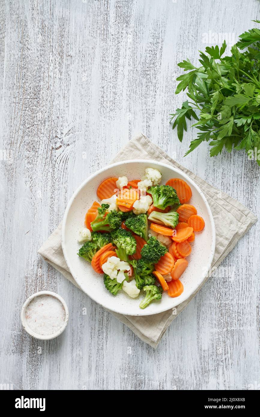 Mix of boiled vegetables. Broccoli, carrots, cauliflower. Steamed
