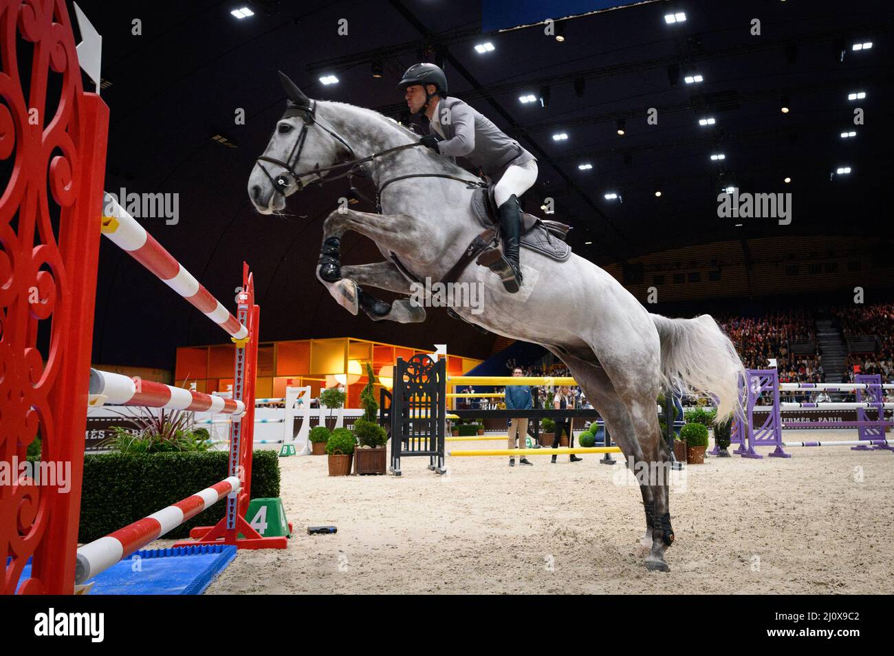Christian Kukuk and Checker 47 compete during the Saut Hermes at Le ...